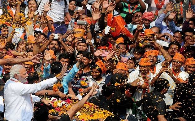 If not skull cap, Modi accepts shawl, flowers from Muslims during roadshow in Varanasi