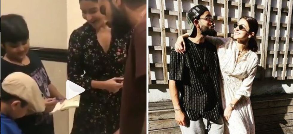 WATCH Anushka Sharma And Virat Kohli Take 7YearOld Fans Autograph