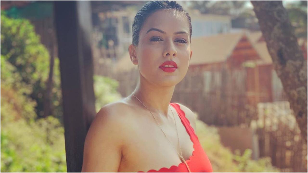 Nia Sharma Looks Super Sexy In Red Bikini And We Are Sweating! - News