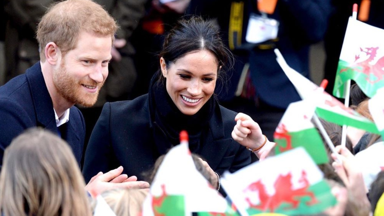 Prince Harry and Meghan Get Standing Ovation In UK